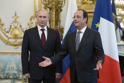 Кемерон не потиснув Путіну руку, а Олланд розмовляв півтори години
