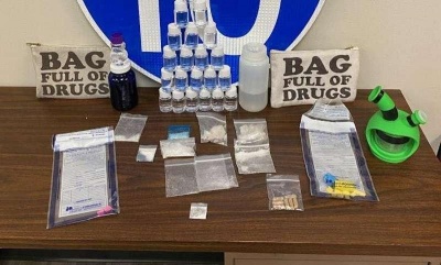 У США затримали дилерів, які перевозили "товар" в сумці з написом "мішок, повний наркотиків"  